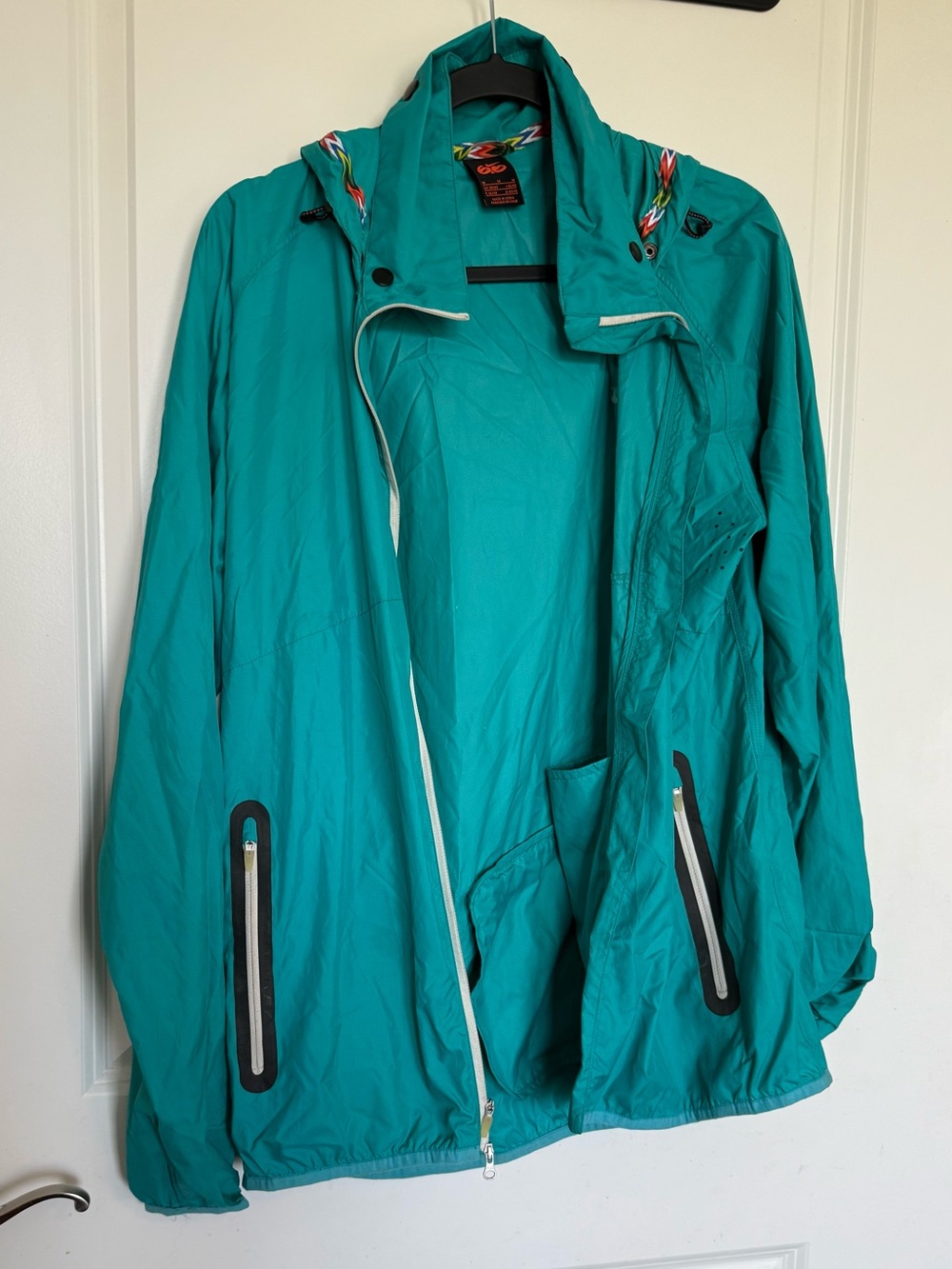 Teal Jacket with Multicolor Chevron Trim